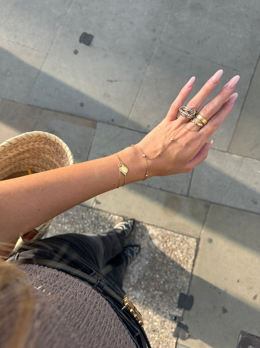 Retiazkový "handchain" náramok Athena zlatý